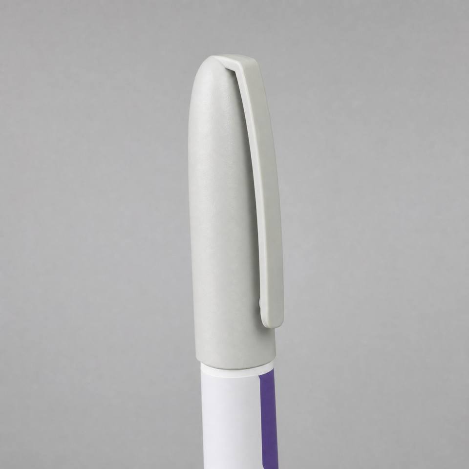Close-up of the cap and clip of a 1:1 injection pen display model in matte grey resin